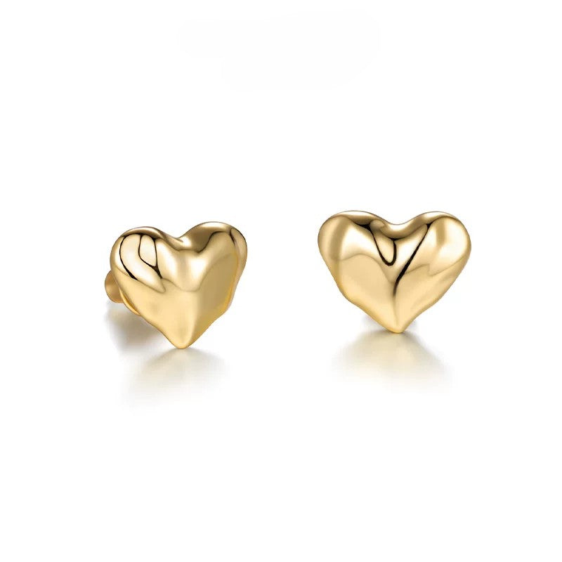 Pair of 18k gold vermeil irregular molten 3D puffy heart stud earrings in a high-polish finish.