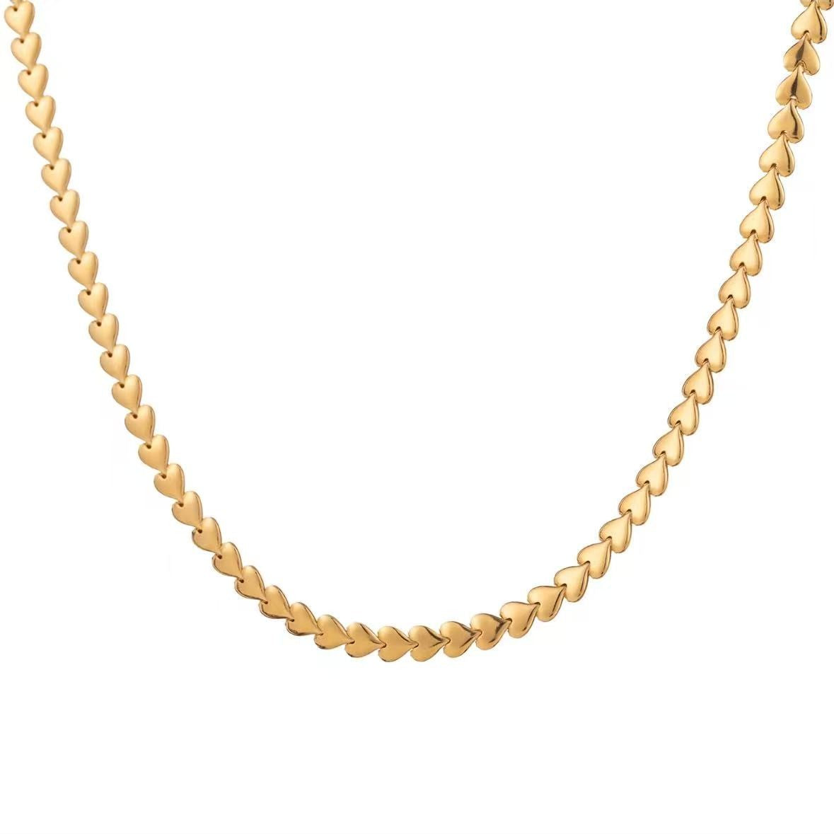 Declaras 18K gold plated S925 sterling silver herringbone snake chain necklace with a smooth minimalist puffed love heart pendant.